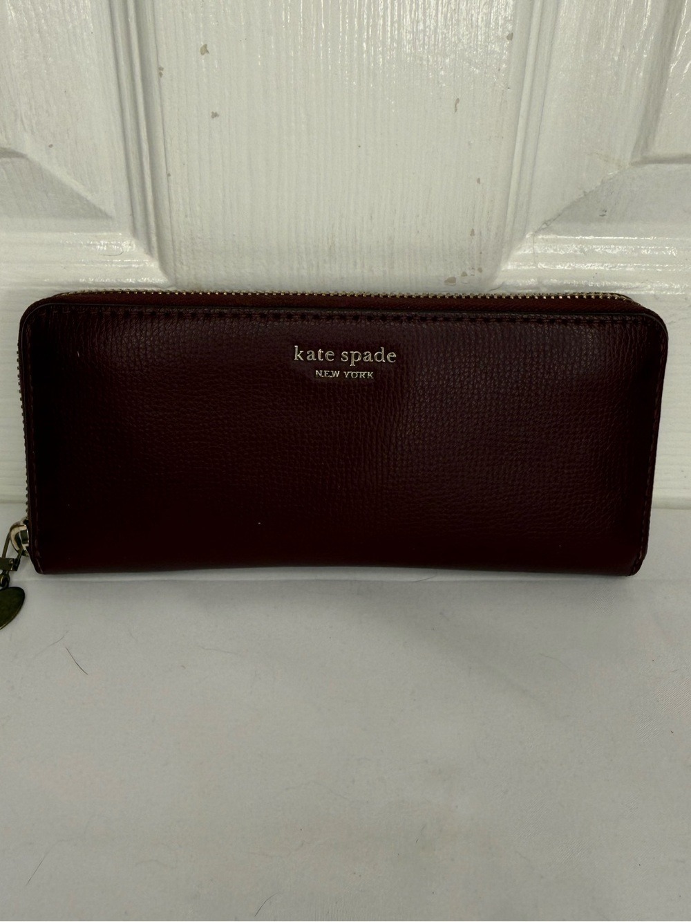 KATE SPADE, NEW YORK LARGE CONTINENTAL WALLET DEEP BURGUNDY
